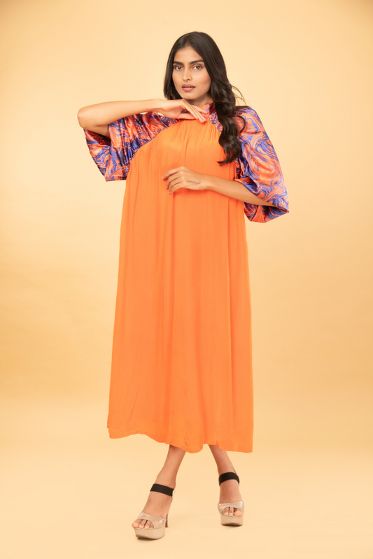 Orange tunic with marble print sleeves